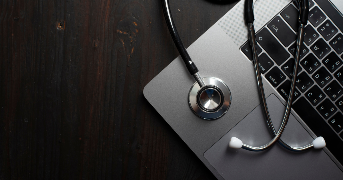 stethoscope on laptop image