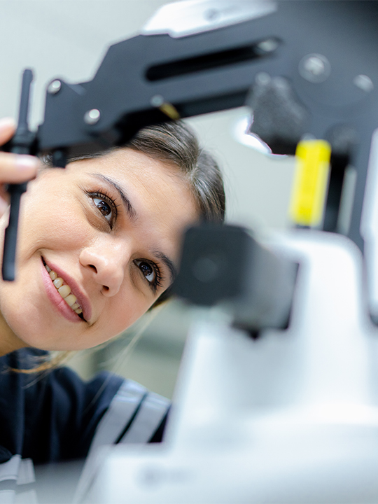 Lux Research Portrait 3 woman inspecting technical gear