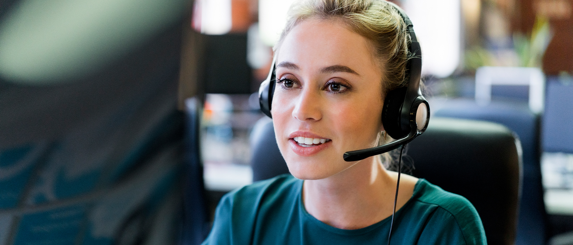 Anywhere 365 header image female worker on headset