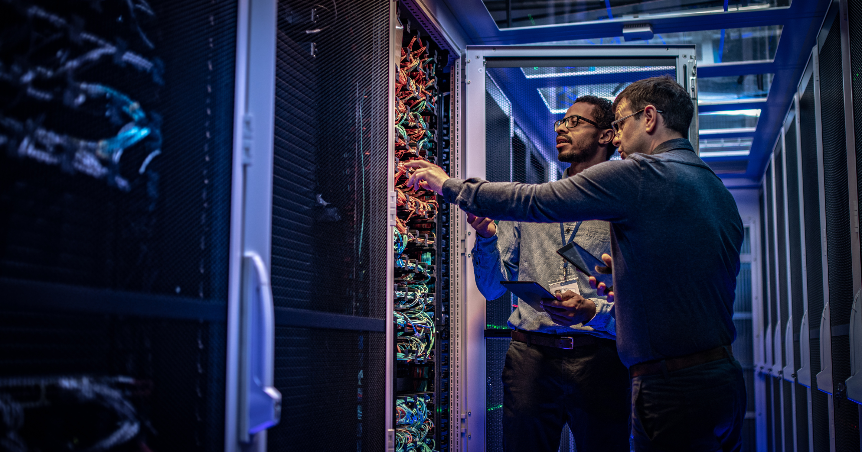 men looking at wires image