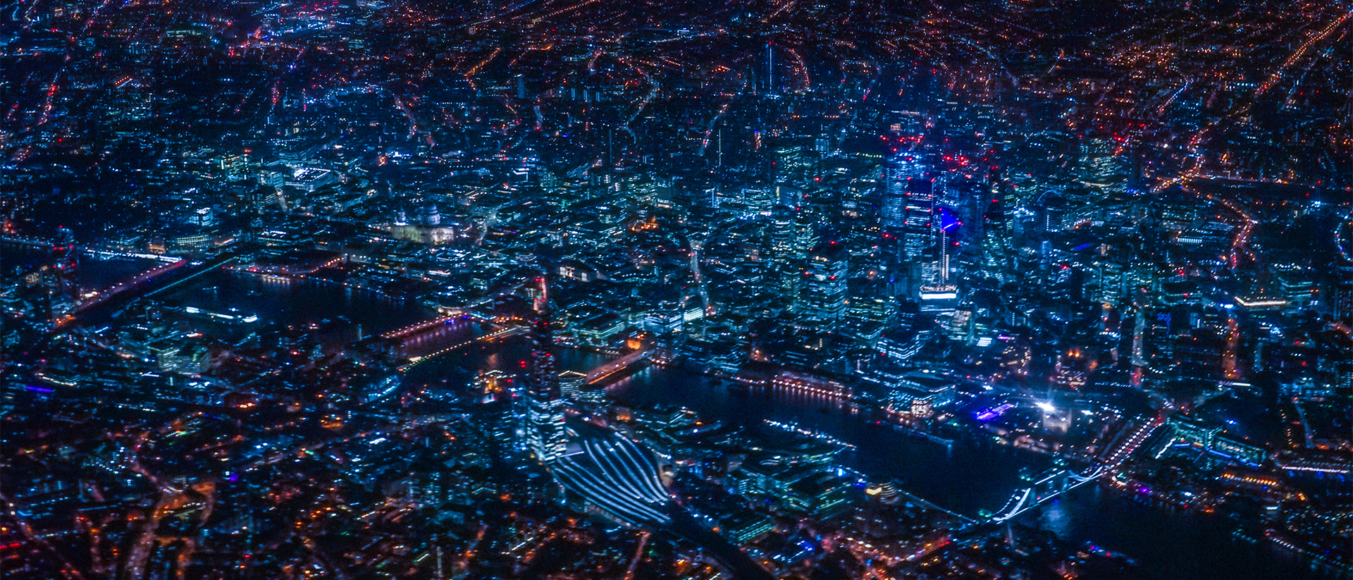 Zeomega Header 3 aerial image of lit up city