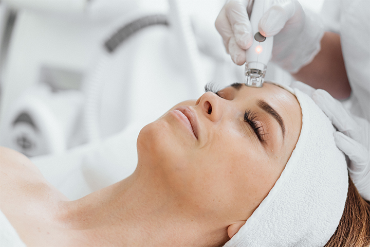 Integrated Dermatology Landscape 3 woman getting a facial