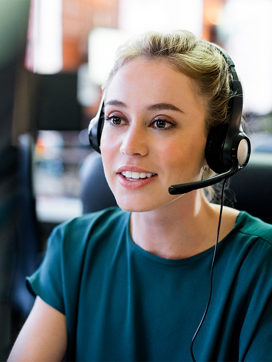 Anywhere 365 Portrait 1 woman with headset on