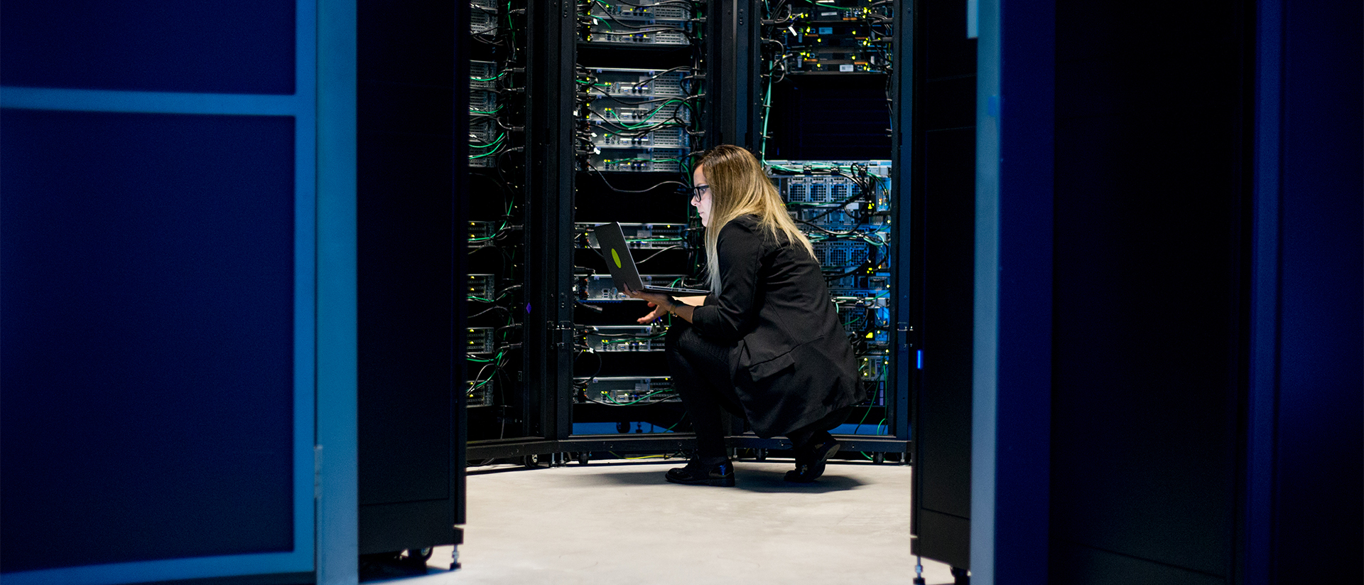 Connectria header image woman in server room