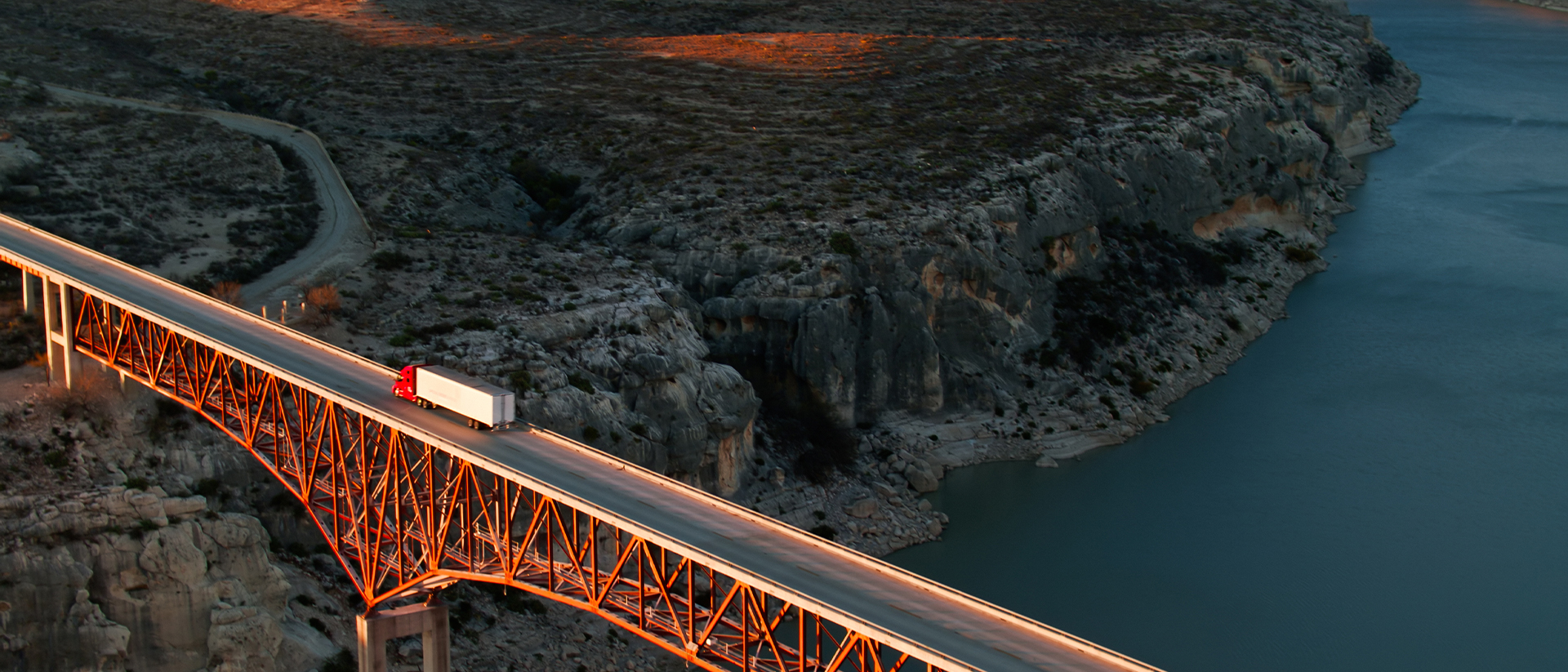 Truckstop Header 3 Aerial image of truck on bridge