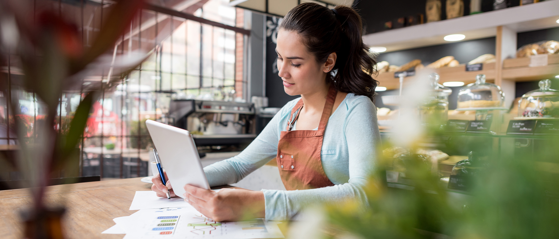 Corcentric header image woman working in shop