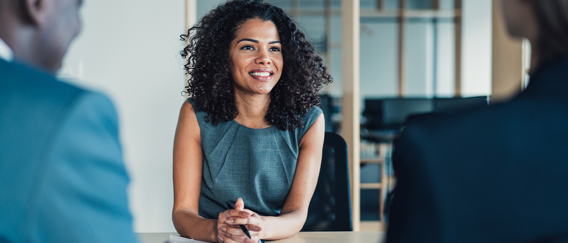 Openlending Header 2 Woman smiling in interview